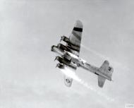 Asisbiz 43 39163 B 17G Fortress 8AF 486BG835BS H8S Happy Warrior hit by incendiaries over Parchim DZ 4KIA 6POW 7th Apr 1945 01