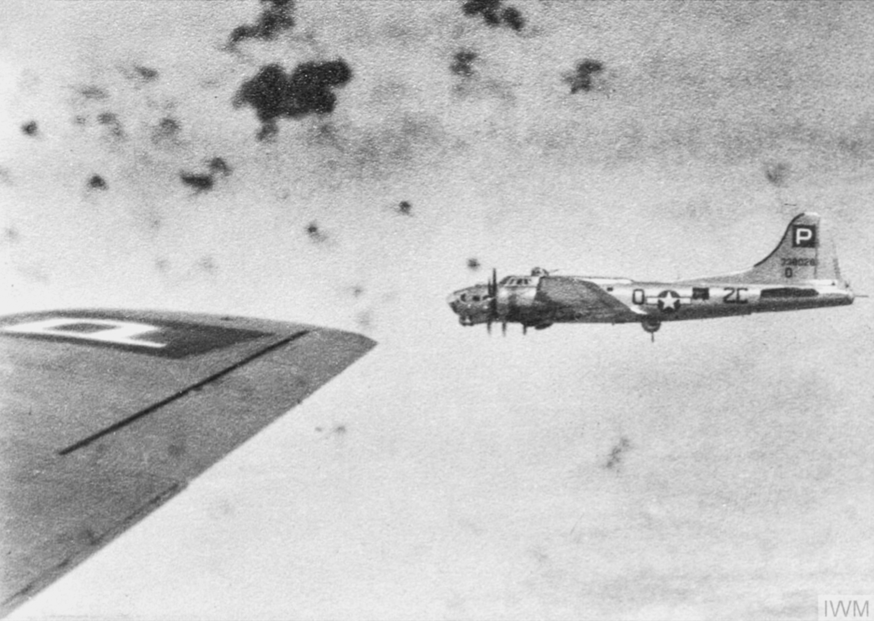 43-38028 B-17G Fortress 8AF 487BG838BS 2CO High Tailed Lady flies through flak FRE8544