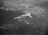 Asisbiz Boeing B-17G Fortress 8AF 487BG836BS 2GS in flight with an engine burning 10th April 1945 FRE14220