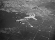 Asisbiz Boeing B 17G Fortress 8AF 487BG836BS 2GS in flight with an engine burning 10th April 1945 FRE14220