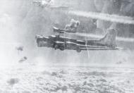 Asisbiz Boeing B-17G Fortresses 8AF 490BG in formation flying through flak FRE8579