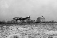 Asisbiz Boeing B 17G Fortress 8AF 493BG is guided in to land at Debach by a mobile control vehicle Jan 1945 FRE8664