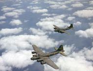 Asisbiz 41 24453 B-17F Fortress 91BG322BS LGO Mizpah aka The Bearded Beauty in flight 01