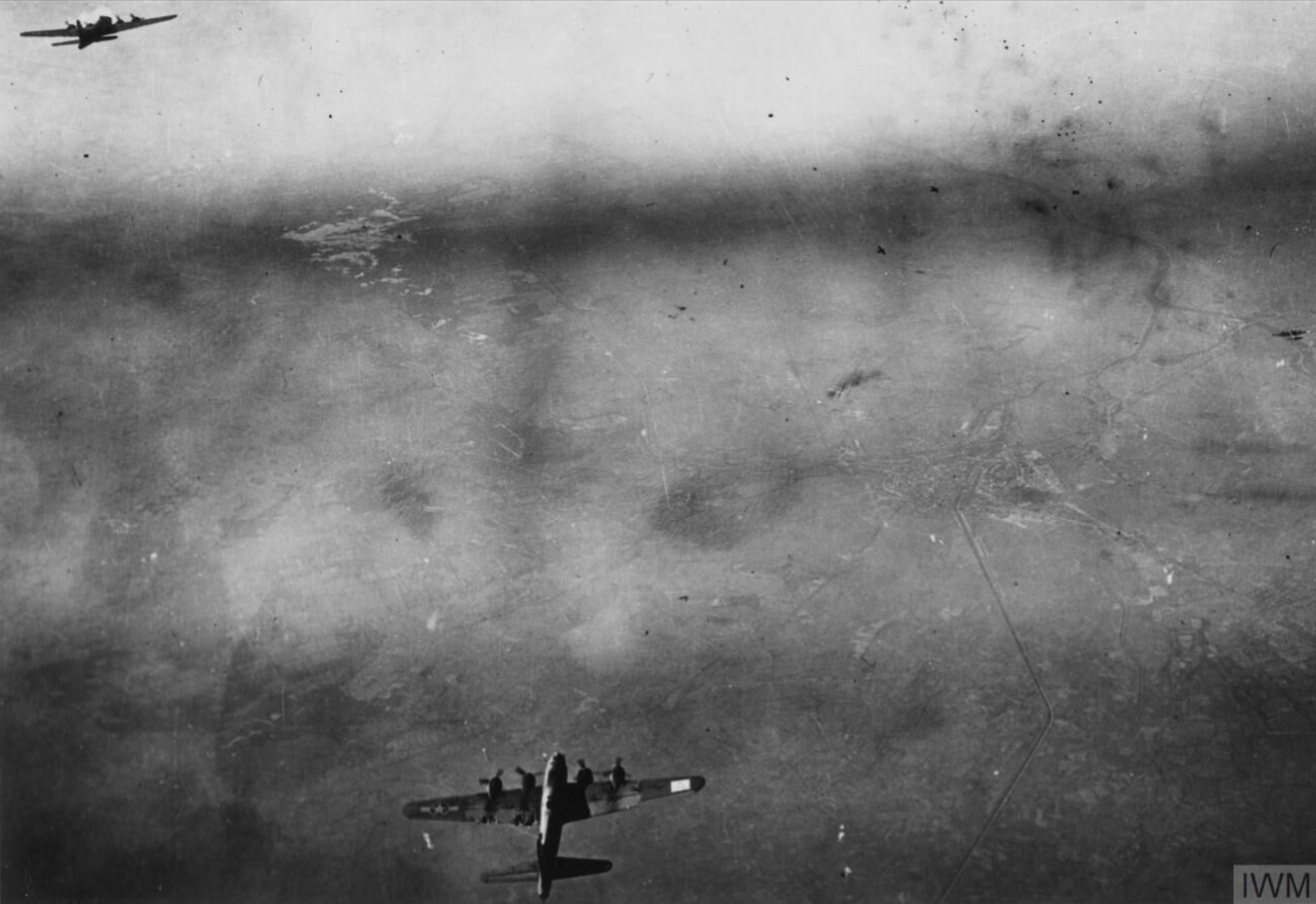 Boeing B 17 Fortresses 8AF 94th Bomb Group fly together during a mission over Gelsenkirchen FRE3870