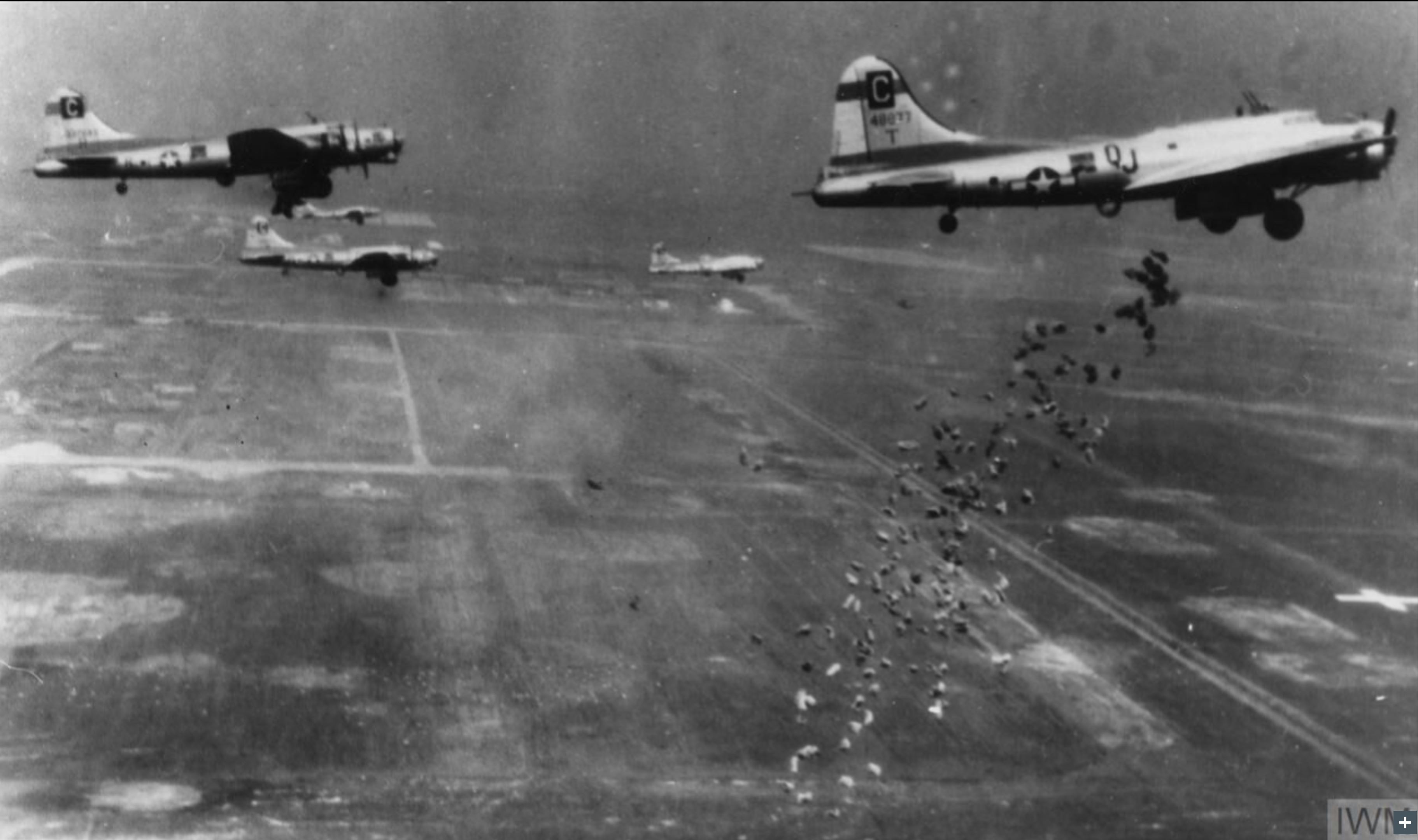 44-8877 B-17G Fortress 8AF 96BG339BS QJT in formation dropping supplies during a mission FRE3990