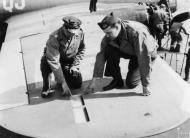 Asisbiz Boeing B 17G Fortress 8AF 96BG339BS QJ Bob Sturges (R) a Boeing engineer inspects a vent in the wing 22nd Aug 1944 01
