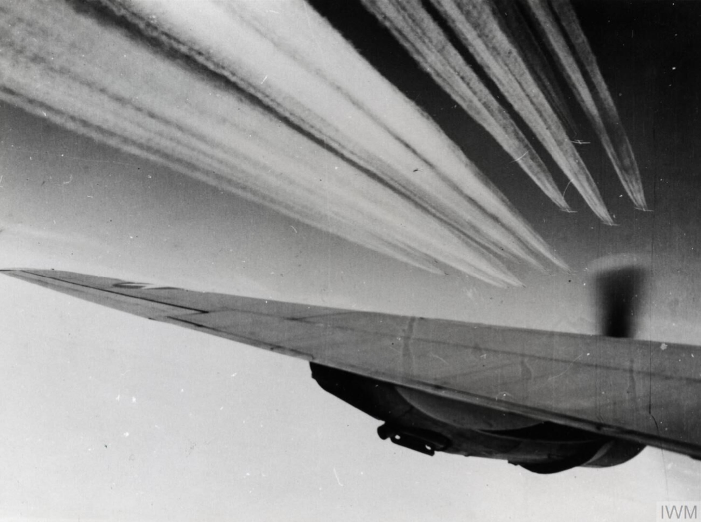 Boeing B-17 Fortresses leaving contrails as they head out on a mission FRE14446