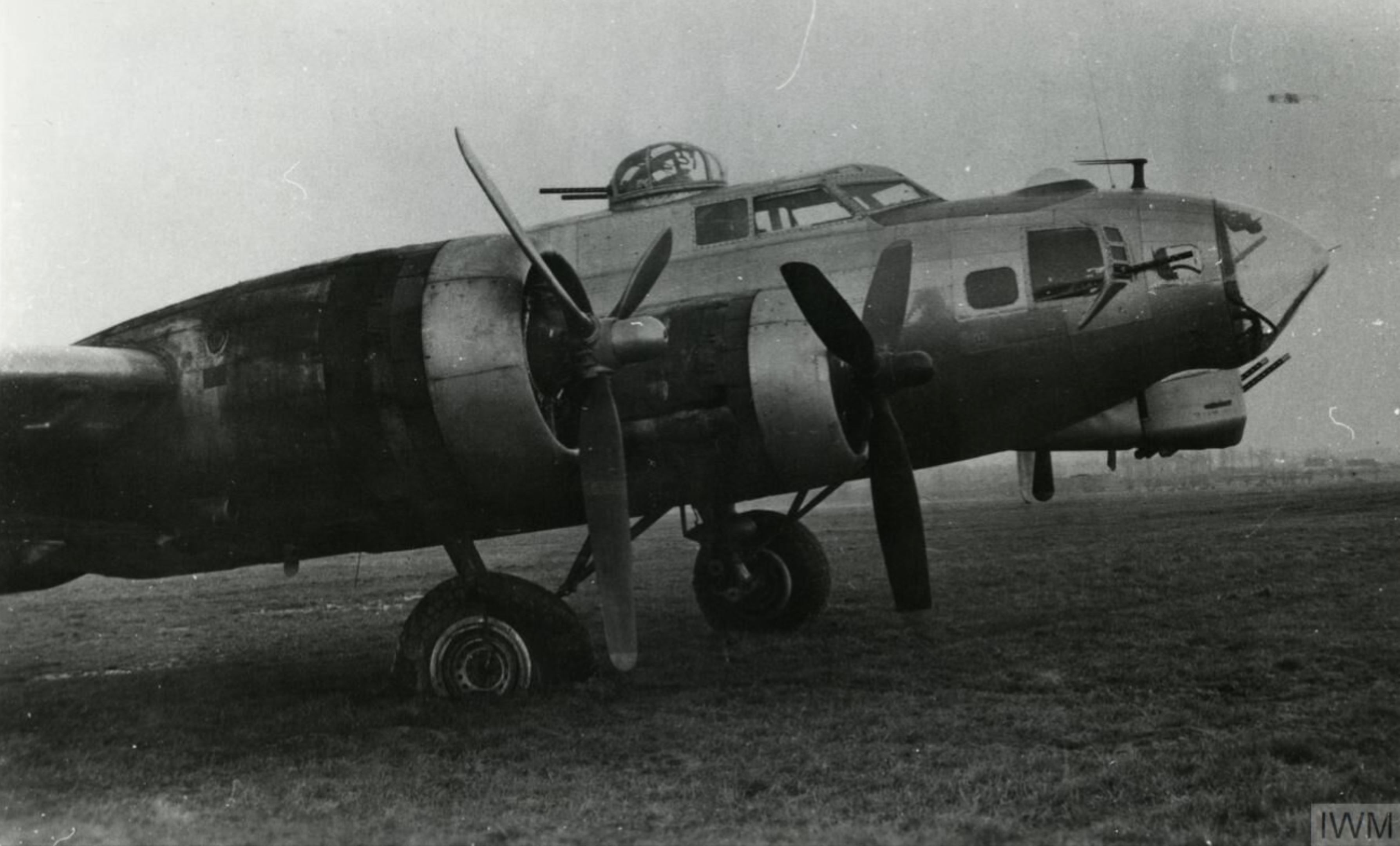 Boeing B-17G Fortress with a feathered prop forced landed at 365FG's base FRE12056