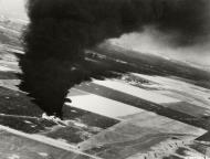 Asisbiz Boeing B 17 Fortress lies burning after belly landing after a raid on Orman airfields 1944 NA1135