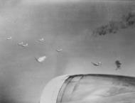 Asisbiz Boeing B 17G Fortress with a burning fuel falls away from its formation over Ruhland Germany FRE11650