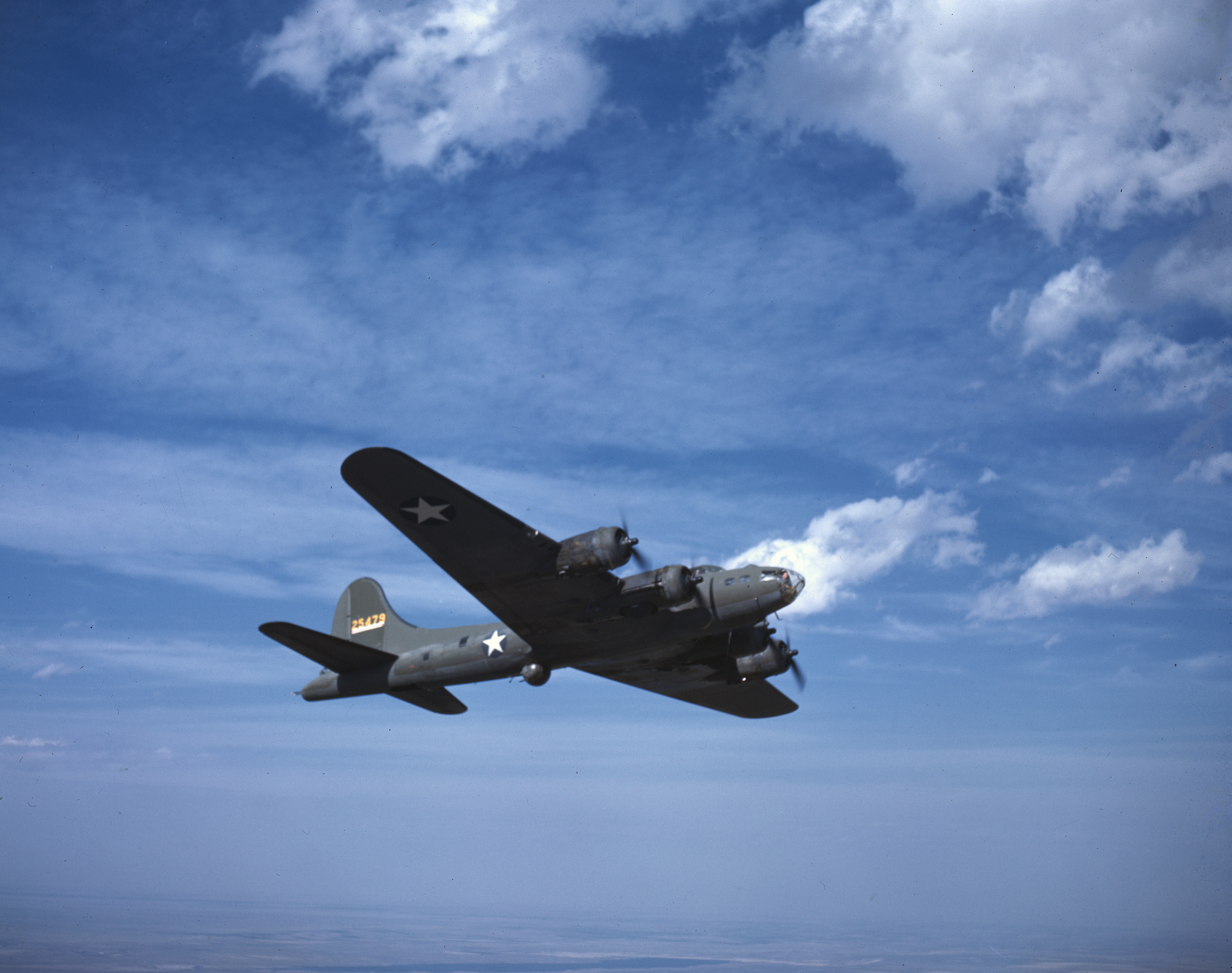 WWII color photo of USAAF 42-5479 Boeing B-17F Fortress during a training flight over America 05