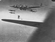 Asisbiz Boeing B 17F Fortresses 8AF in tight formation over the drop zone Oct 1943 FRE1634