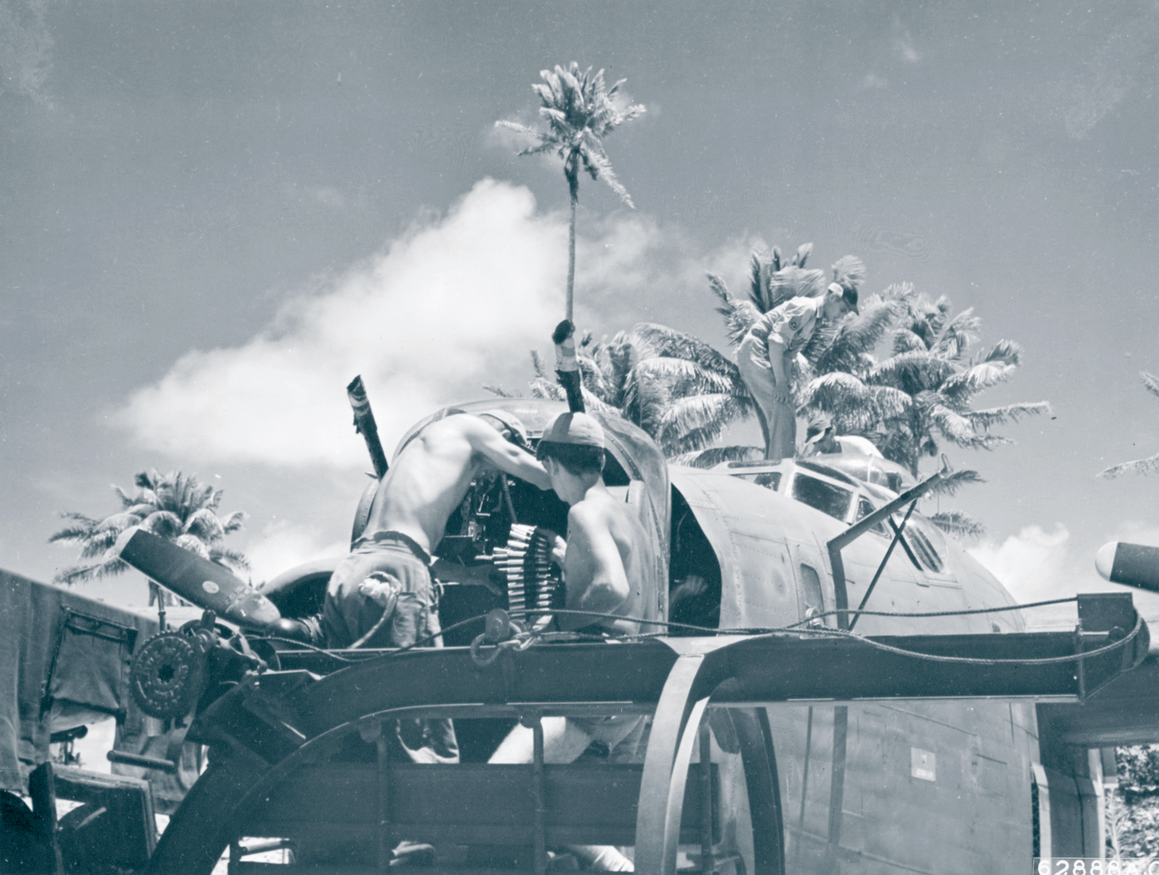 7AF 11BG B-24 Liberator being rearmed at Funafuti Island Ellice Isls 1943 NA702