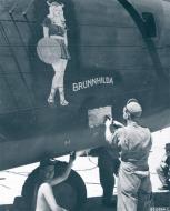 Asisbiz 41-23838 B-24D Liberator 7AF 11BG42BS Brunnhilda at Funafuti being repaired from shrapnel 17th Nov 1943 NA863