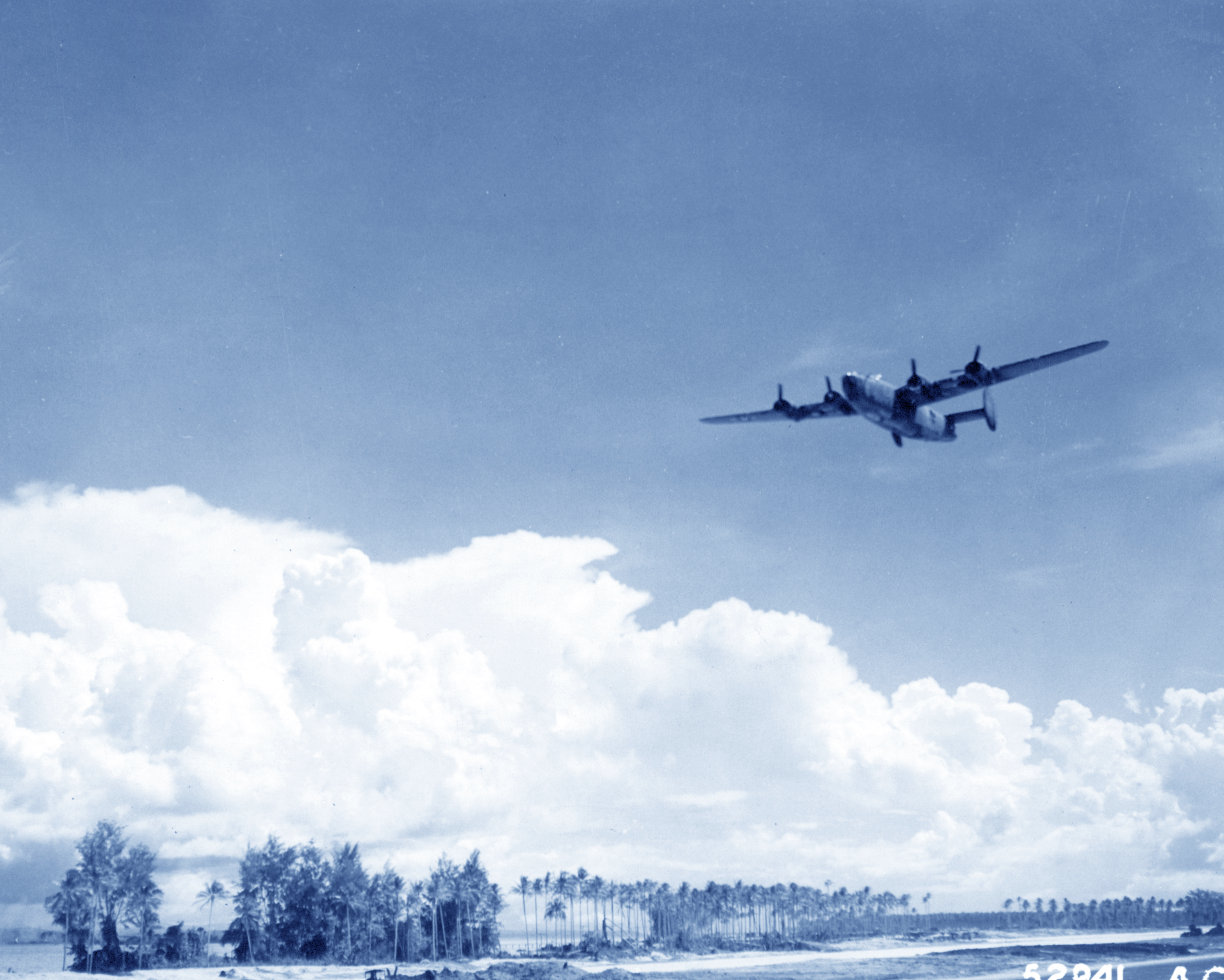 42-40323 B-24D Liberator 7AF 307BG371BS Frenisi buzzing the field after 100 missions Aug 1944 NA861