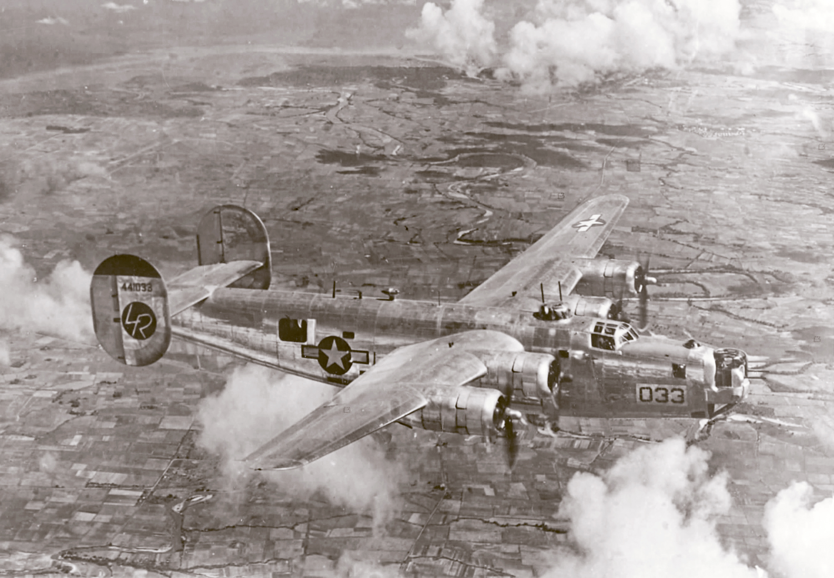 44-41033 B-24J Liberator 7AF 307BG370BS in flight over Negros Island Philippines 1944 01