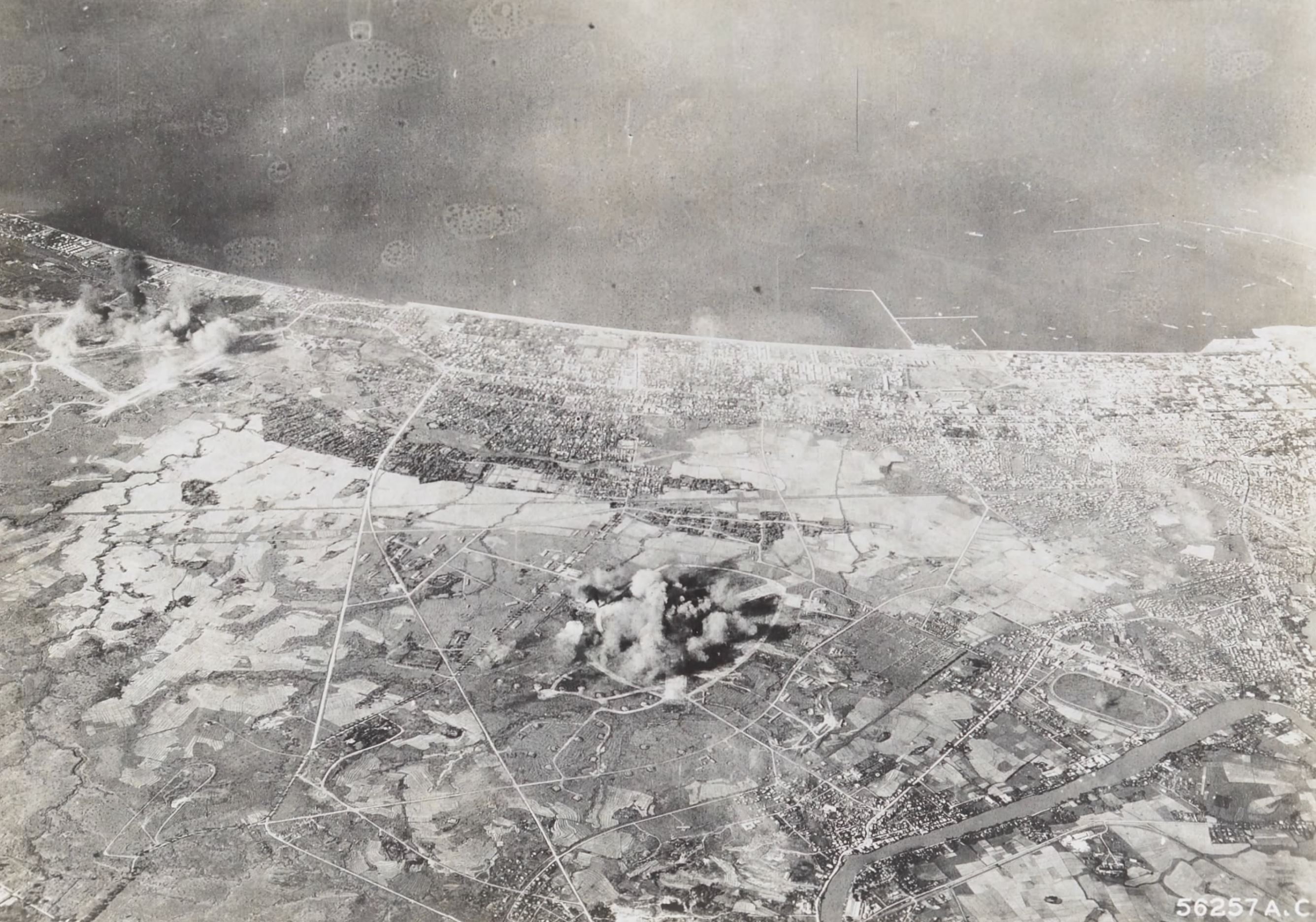 Target 13AF 307BG B-24 Liberators bomb Nielson field near Manila Philippines 01