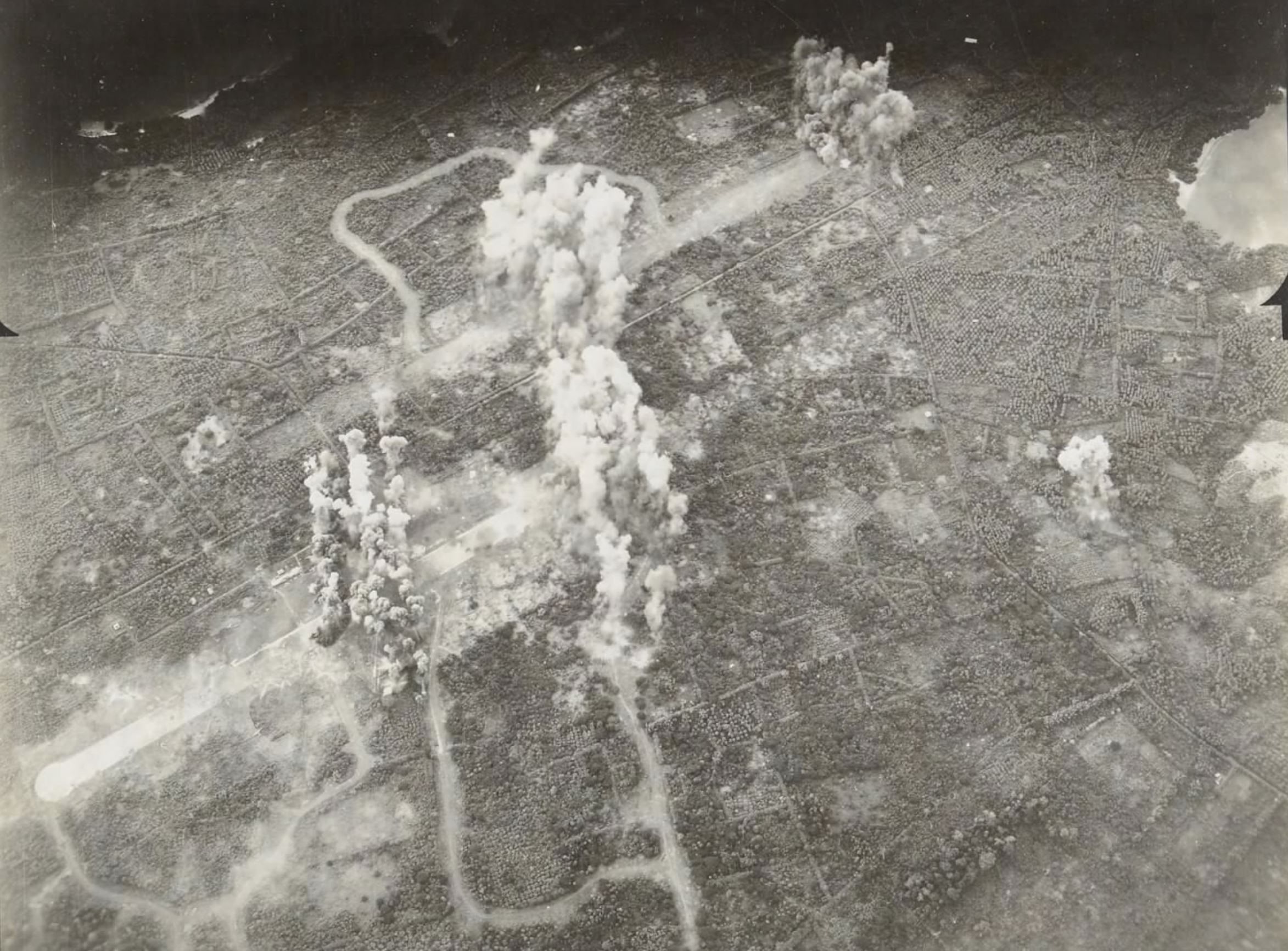 Target 13AF 307BG B-24 Liberators bomb Puerto Princesa airfield Palawan Is Philippines 03