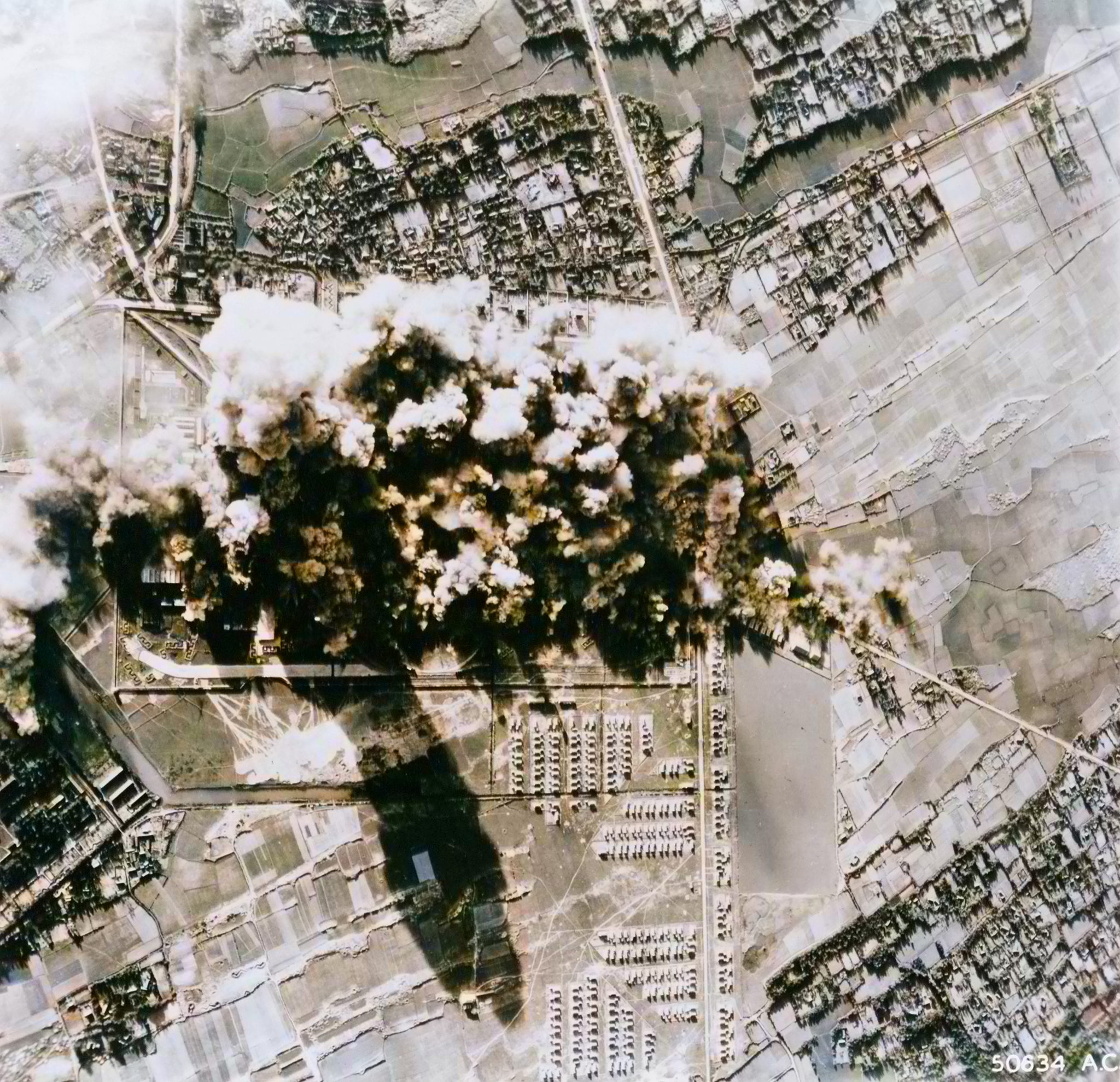 Target 14AF 308BG425BS B-24 Liberators bomb railway repair shop at Vinh French Indo China 16th Mar 1944 03