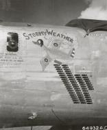 Asisbiz 44-40556 B-24J Liberator 7AF 30BG38BS Stormy Weather nose art left side 01