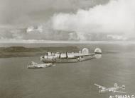 Asisbiz 44-40683 B-24J Liberator 7AF 30BG819BS Curly Bird enroute to bomb Iwo Jima Bonin Isls 21st Oct 1944 01