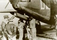 Asisbiz 42 50290 B 24H Liberator 8AF 389BG565BS EED in flight launches a rocket from beneath its tail FRE1552