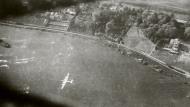 Asisbiz Consolidated B 24 Liberator 8AF 389BG flies low over the Rhine during a trolley mission 1945 FRE8033