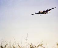 Asisbiz Consolidated B 24 Liberator 8AF 389BG on final approach to land at Hethel FRE6483