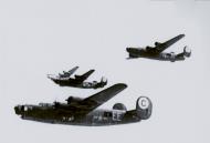 Asisbiz Consolidated B 24 Liberators 8AF 389BG565BS EE fly in formation during a mission FRE14246