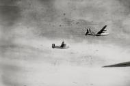 Asisbiz Consolidated B 24 Liberators 8AF 389BG567BS HP in formation fly through flak during a mission FRE1546