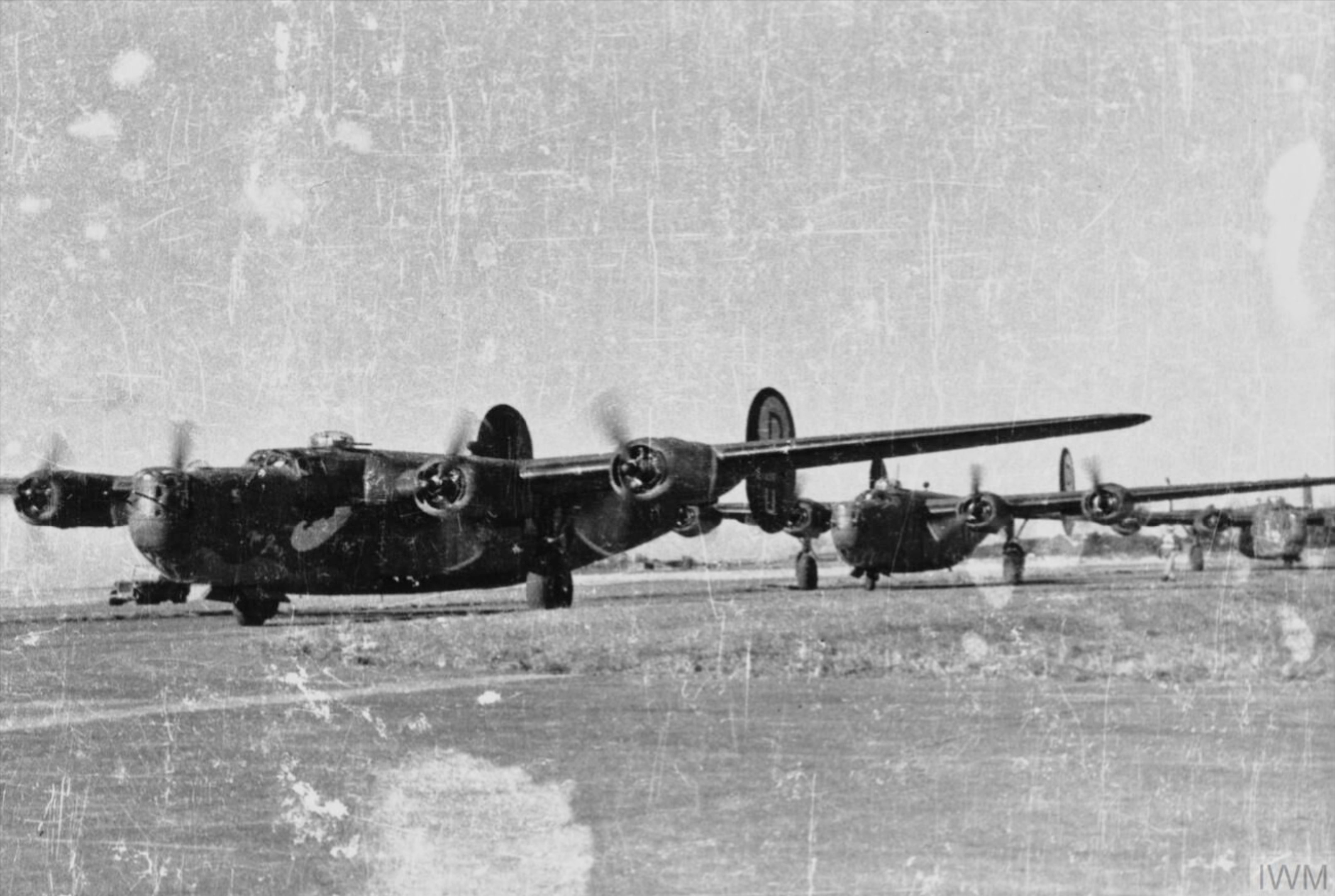 Consolidated B-24 Liberators 8AF 392BG576BS line up for take off FRE8026