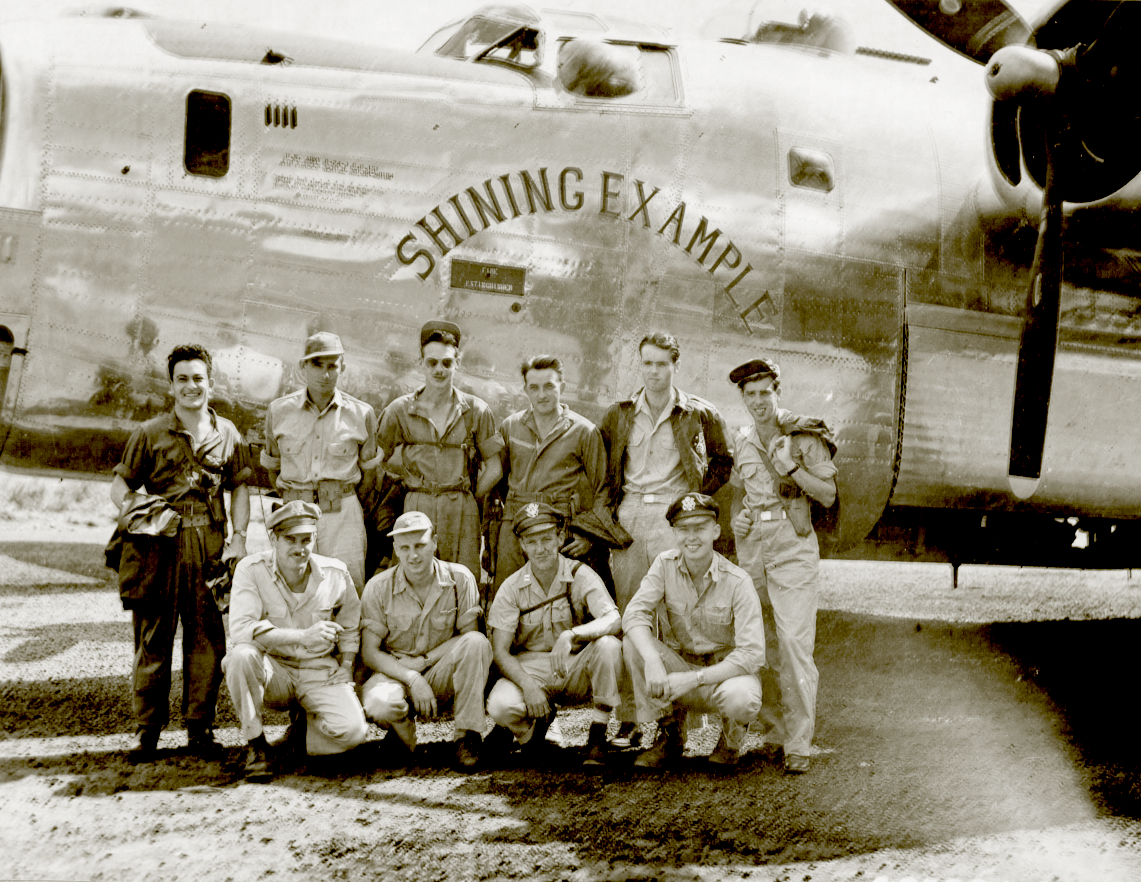 44-40184 B-24J Liberator 5AF 43BG64BS Shining Example with crew and nose art left side 01