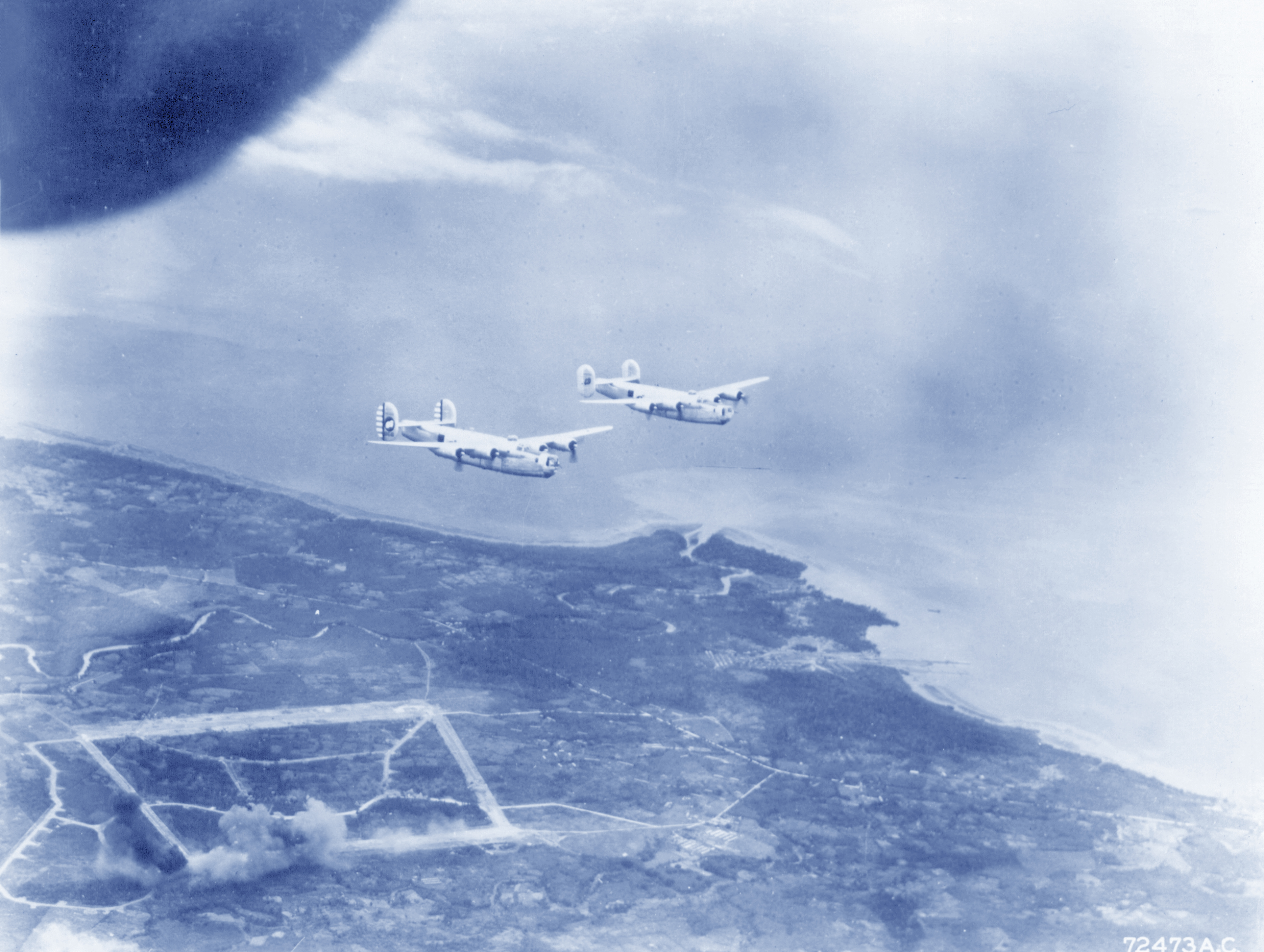 5AF 43BG65BS B-24 Liberators after bombing Dobodura airstrip Papua New Guinea 1943 NA864