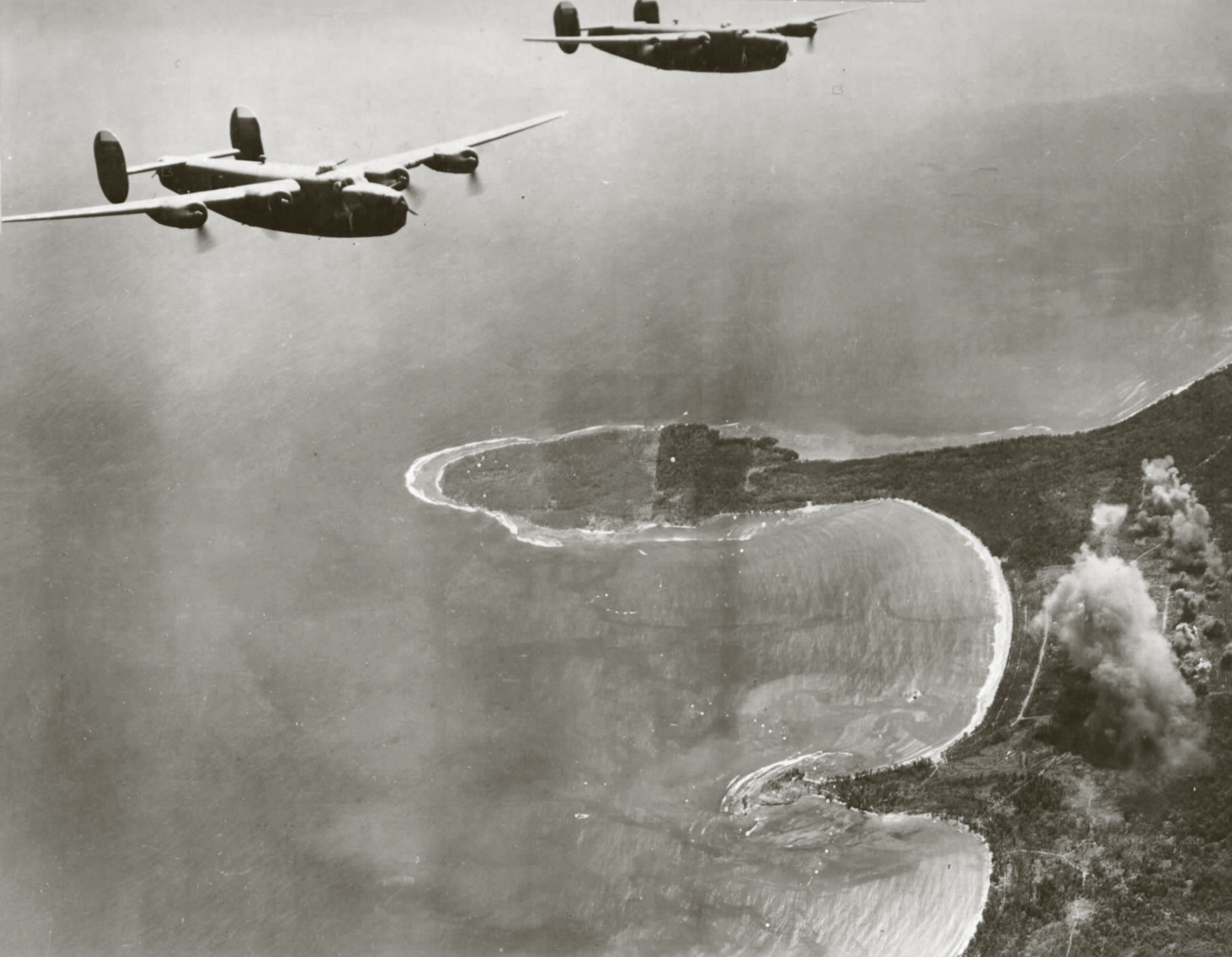 Consolidated B-24D Liberators 5AF 43BG63BS bomb the Boram airstrip at Wewak New Guinea 18th Feb 1944 01