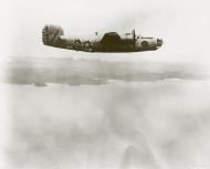 Asisbiz 44-40395 B-24J Liberator 5AF 43BG64BS Bob's Hope in flight over New Guinea 1944 01