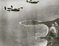 Asisbiz Consolidated B-24D Liberators 5AF 43BG63BS bomb the Boram airstrip at Wewak New Guinea 18th Feb 1944 01