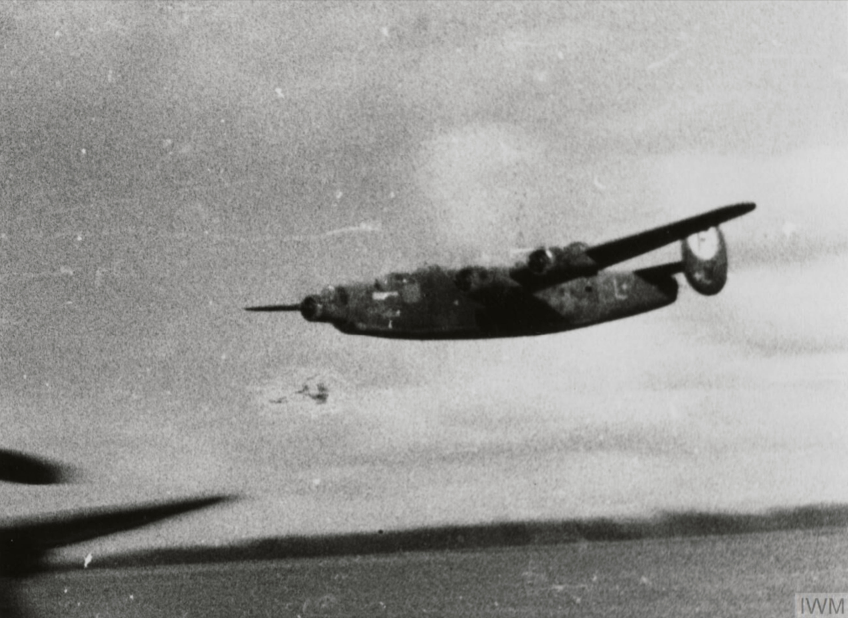 Consolidated B-24 Liberator 8AF 445BG L+ does a low pass FRE8103