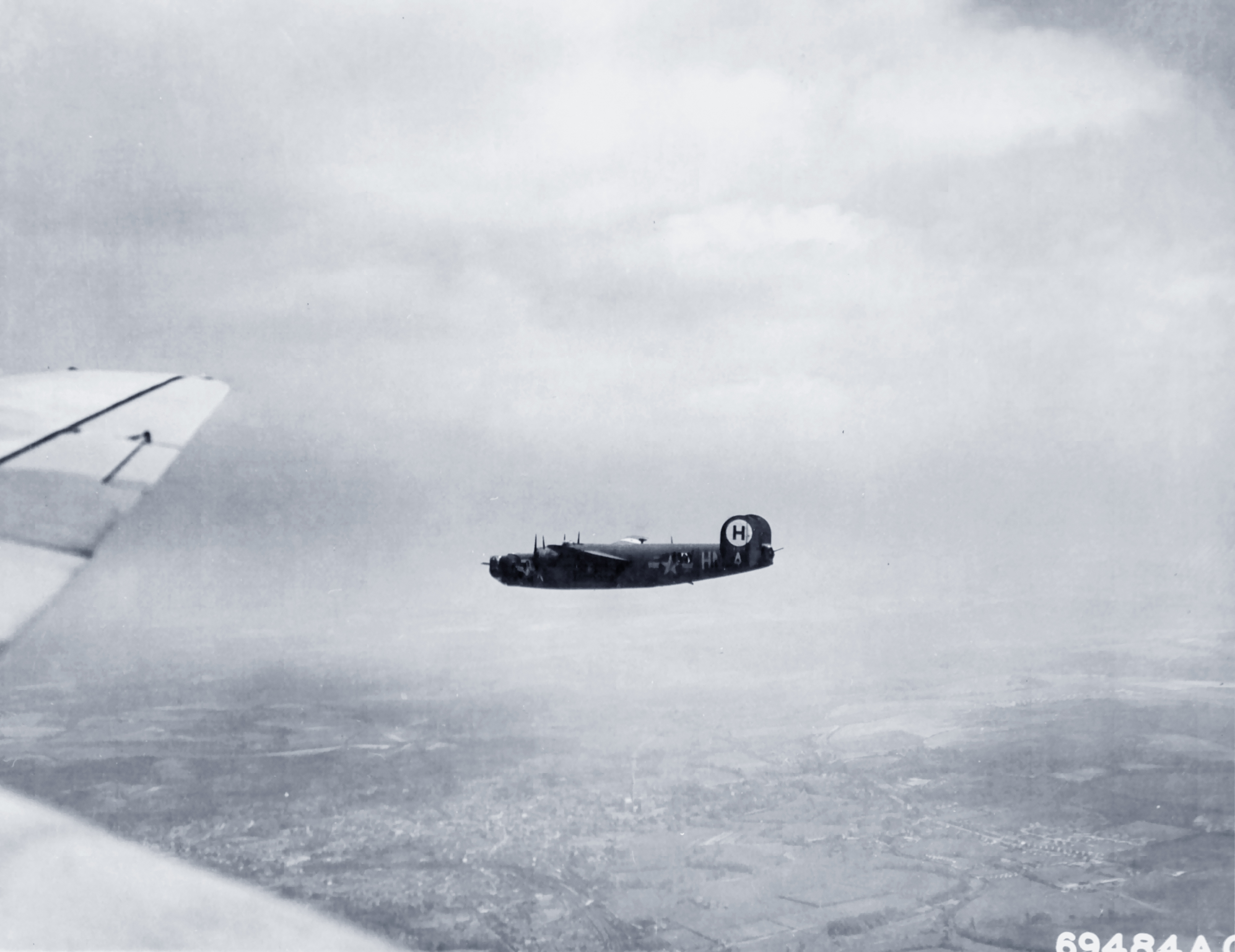 42-7576 B-24H Liberator 8AF 446BG705BS HNA Star Dust returning to its base in England 01