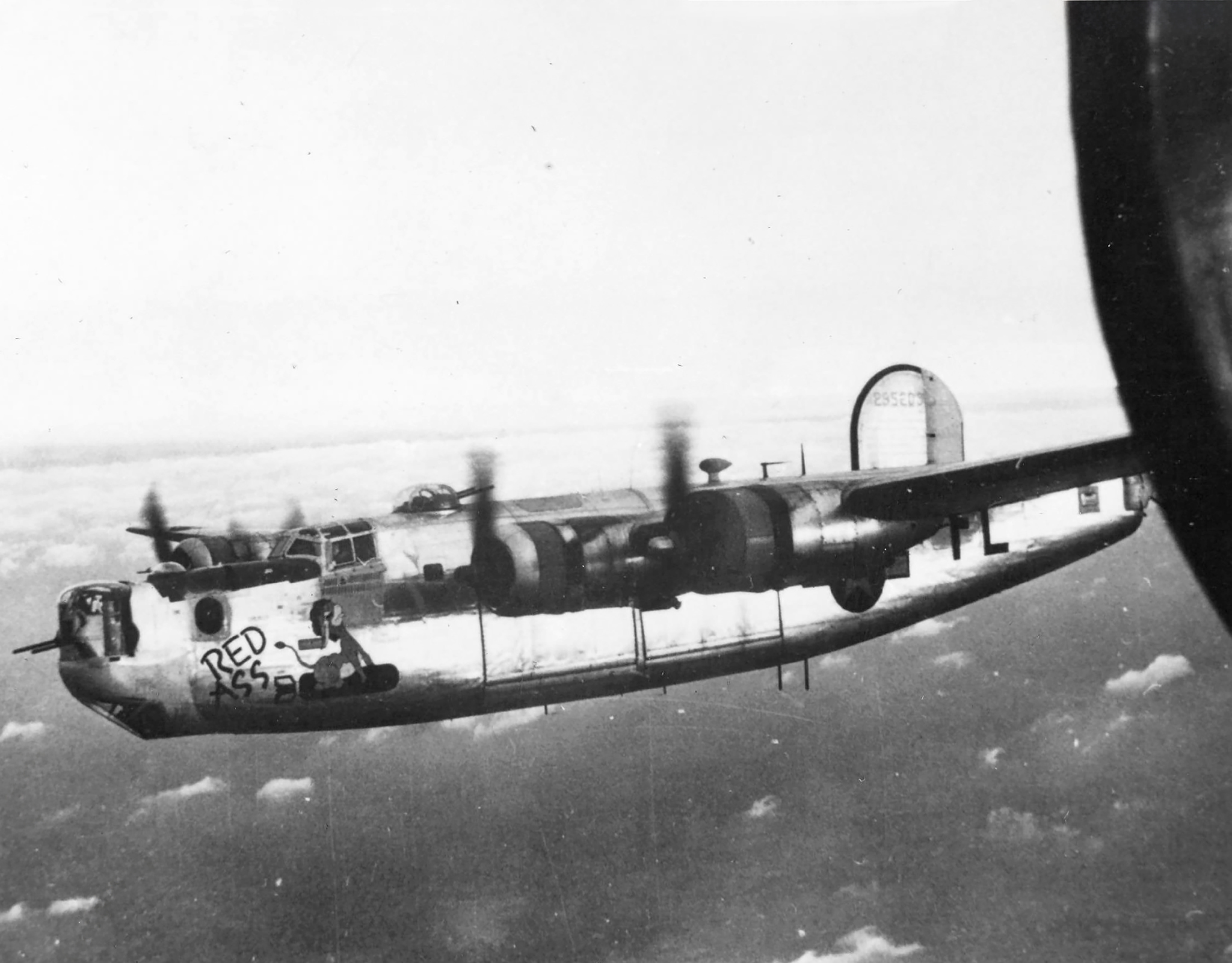42-95203 B-24H Liberator 8AF 446BG704BS FLD Red Ass returning to its base in England 02