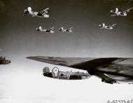 Asisbiz 41-29141 B-24H Liberator 8AF 446BG706BS RTO Kill Joy fly in formation enroute to the target of the day 02
