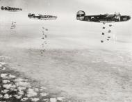 Asisbiz 41-29144 B-24H Liberator 8AF 446BG704BS FLP Ronnie over the Rheine Marshalling Yards 9th Mar 1945 FRE1750