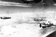 Asisbiz Consolidated B-24 Liberators 8AF 446BG705BS HNM formation over Ludwigshafen drop zone Germany 31st July 1944 01