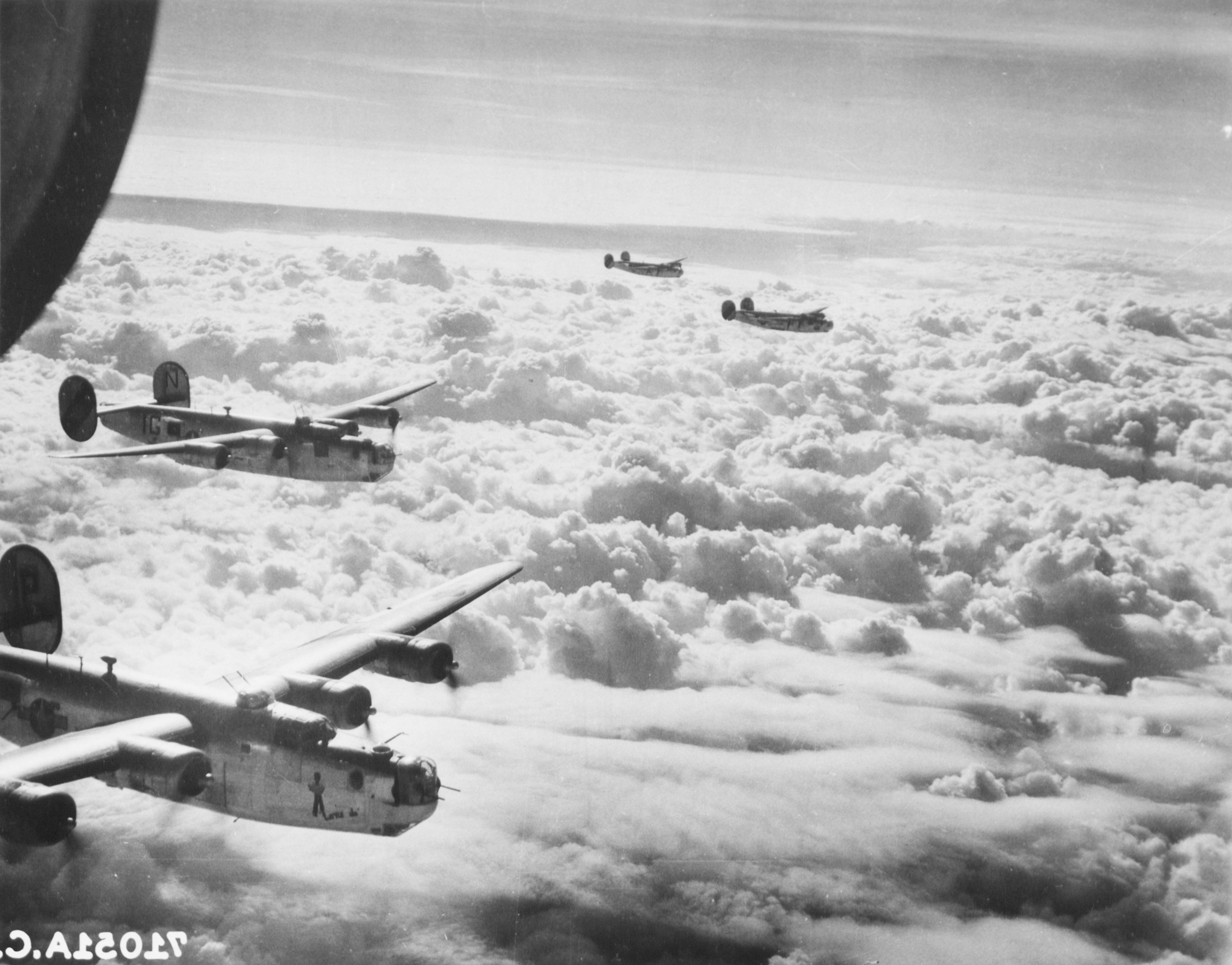 44-10556 B-24J Liberator 8AF 448BG713BS IGN Mother of Ten in formation with IGP on a mission 24th Nov 1944 01