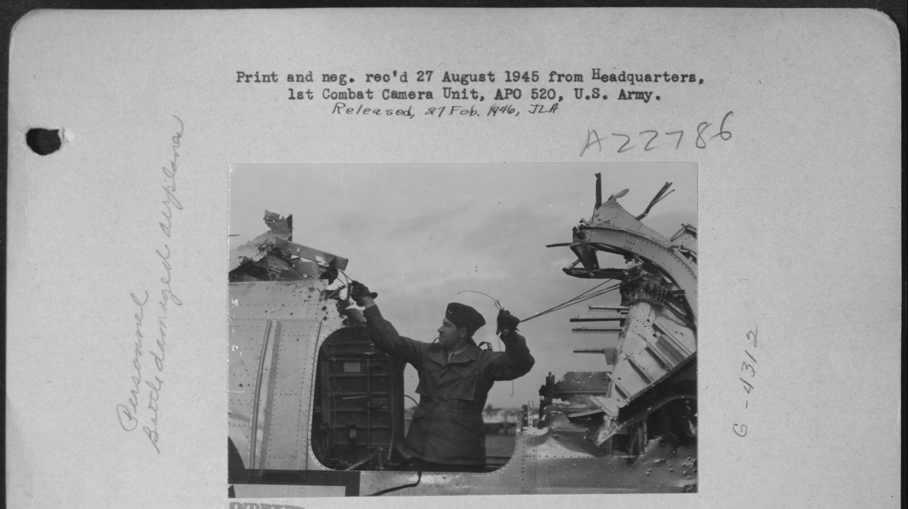 44-10570 B-24J Liberator 15AF 449BG717BS 43 88mm AAA damage to waist gun position 23rd Nov 1944 02