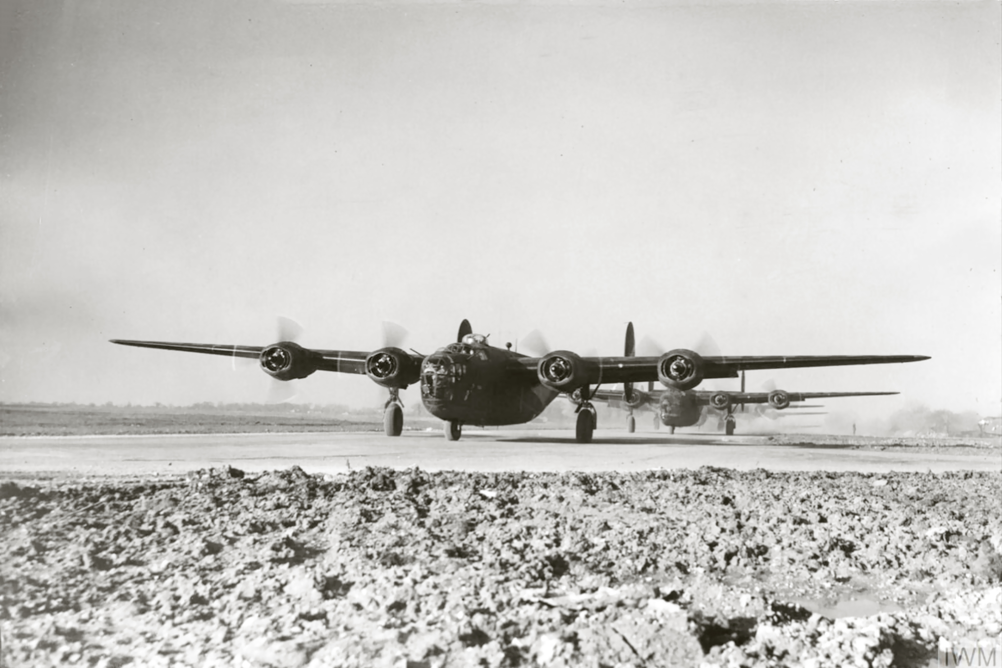 Consolidated B-24D Liberators 8AF 44BG line up for take off 16th Feb 1943 FRE3453