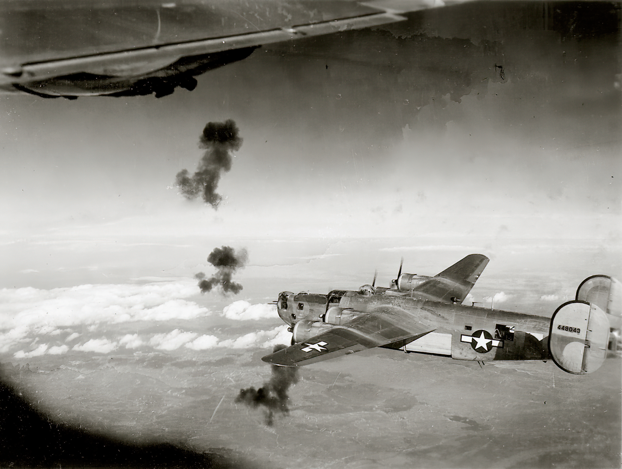 44-49043 B-24L Liberator 15AF 451BG727BS 5 and 65 Short Stuff flying through flak on a mission 01