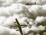 Asisbiz 44-49647 B-24J Liberator 15AF 451BG724BS 21 Flying Ass with B 17G 2BG96BS over Austria 13th Feb 1945 01