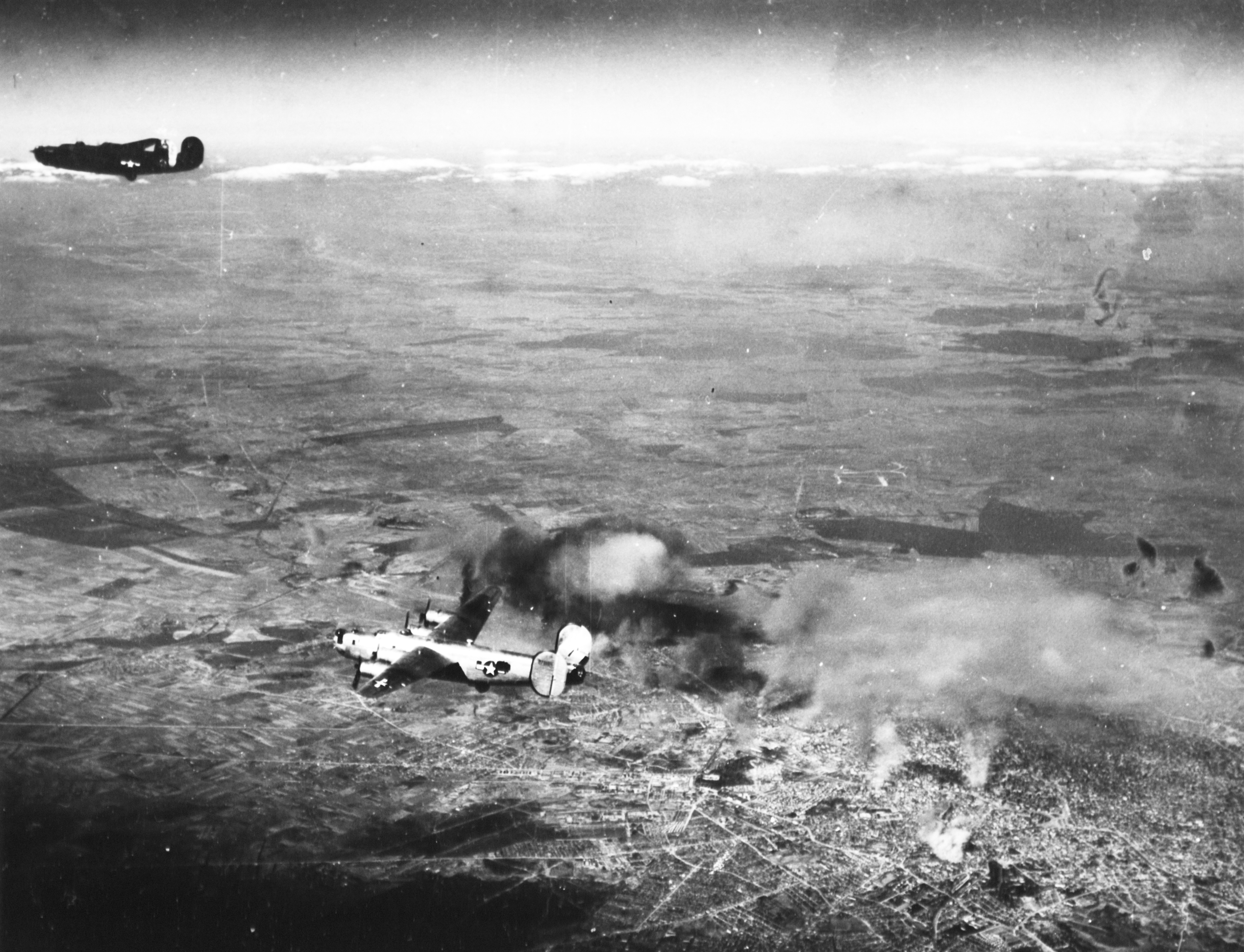 Consolidated B-24 Liberators 15AF 455BG and 450BG (L) after bombing installations at Bucharest Rumania 4th April 1944 01