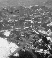 Asisbiz Consolidated B-24 Liberator 15AF 454BG741BS 25 and 20 flying in close formation during a mission over Nazi held Europe 1944 01