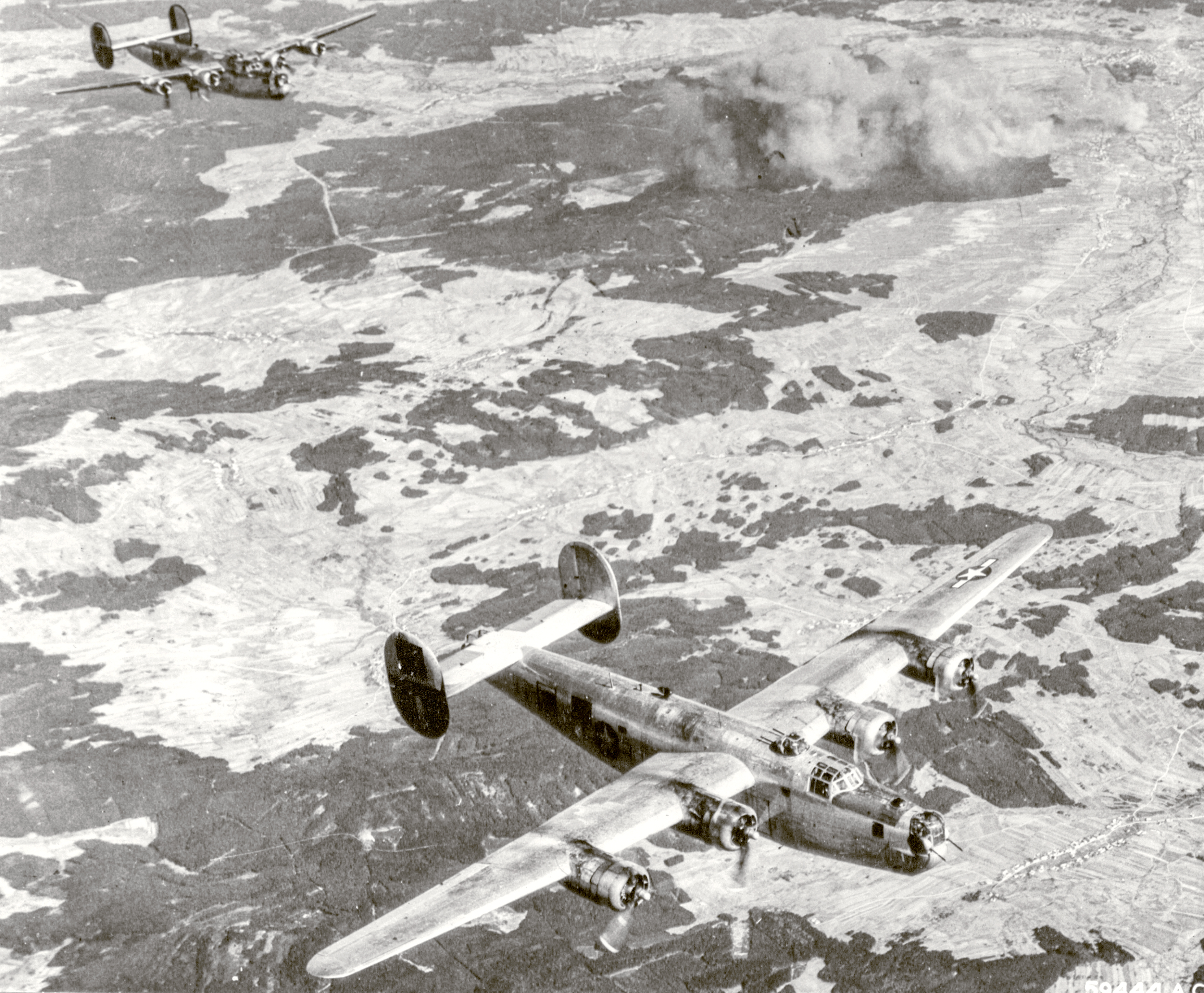 Target 15AF B-24 Liberators 464BG bomb the Tokal airdrome Budapest Hungary 6th Jan 1945 01